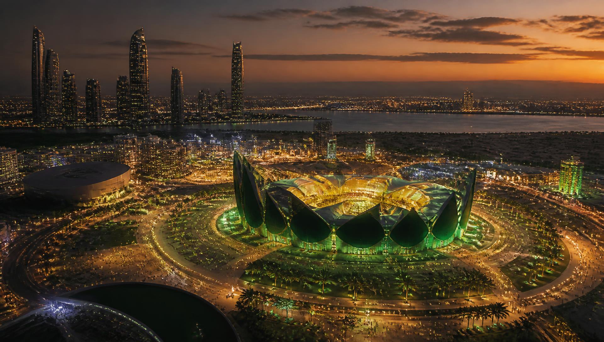 Aerial view of a UAE mega-event venue illuminated at dusk